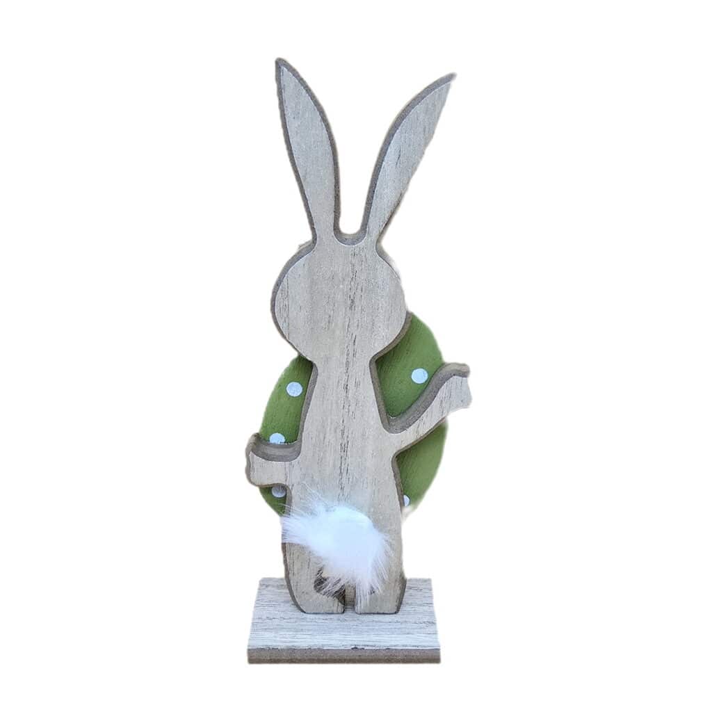 Osterhase aus Holz mit grünem Ei